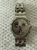 Front view of Swatch Irony chronograph watch showing dial and bracelet