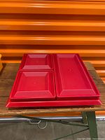 All pieces stacked showing lids and base