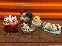 All five salt and pepper shaker sets grouped together