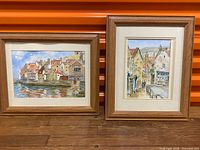 Front view showing both framed paintings