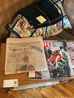 Stack showing Kingston Whig-Standard millennium edition beneath Life Churchill issue