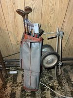 Bag with clubs and pull cart