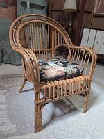 Front view of bent bamboo chair with cushion
