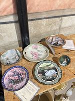 Six plates laid out showing artwork and sizes