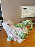 full view of frog-shaped teapot