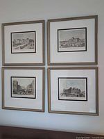 All four framed prints on wall