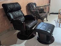 Full view of chair and ottoman showing style and materials