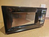 Front view of Emerson microwave showing overall condition