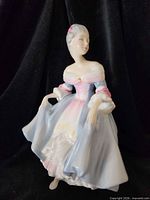 Front view of Royal Doulton Southern Belle figurine showing overall form and colours