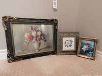 All three framed prints grouped together