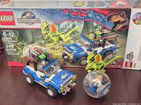 Full set with box, vehicle, dinosaur, gyrosphere and minifigures