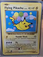 Front of Flying Pikachu card showing image, number, moves