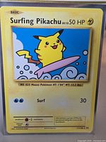 Front of Surfing Pikachu card showing artwork, stats and number 111/108