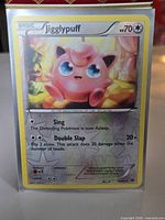 Front of sleeved Jigglypuff reverse holo card