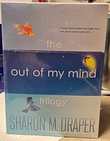 Front view of sealed trilogy slipcase