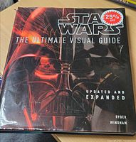 Front dust jacket showing title and 25% off sticker