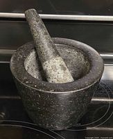 front view of granite mortar and pestle set