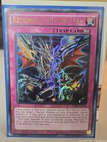 Front of card in sleeve showing title, rarity, artwork, set code