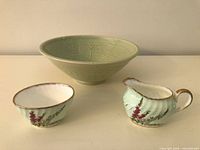 Three-piece lot: green pottery bowl, Foley Highland Heather sugar bowl and creamer