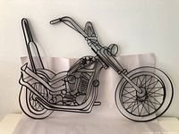 Full view of metal chopper motorcycle wall art