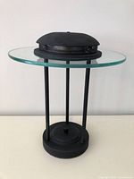 Lamp unlit showing full structure with glass ring and metal base