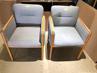 Both oak dining chairs side by side