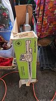 Original Craftsman Bushwacker 18 box with trimmer and power cord visible
