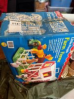 Damaged top of original Fisher-Price Little People Farm box
