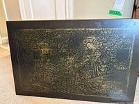 Full view of black and gold Madonna and Child wall panel
