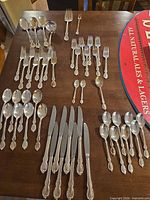 Overview of entire flatware set laid out by type
