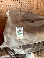 Taupe Roots Outdoors cover showing brand text