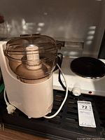 Full view of Sunbeam Oskar grinder with cord