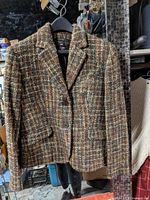 Front view of Louben tweed blazer on hanger