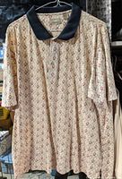 Front view of Natural Issue patterned polo shirt hanging