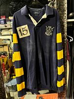 Full front view showing shirt, stripes, patch, collar