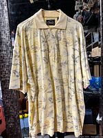 Front view of Rick's Cafe short-sleeve shirt hanging