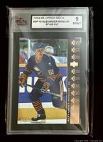 Front of graded Alexander Mogilny SP Die Cut card showing action image, Upper Deck logo and KSA grade 9 Mint label