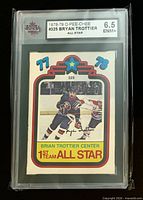 Front of graded Bryan Trottier O-Pee-Chee card showing label and image