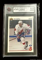 Front view of graded Eric Lindros Upper Deck card showing player image and KSA 8.5 label