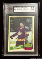 Front of graded Marcel Dionne O-Pee-Chee card showing player image, grade label