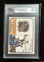 Front of KSA-slabbed Mike Bossy OPC card showing grade 6.5 label and card image