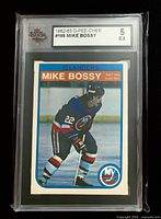 Front of slabbed Mike Bossy O-Pee-Chee card with KSA grade 5 label
