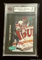 Front of slabbed Nicklas Lidstrom rookie card showing action photo, Parkhurst logo, KSA label grade 9