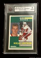 Front view of encapsulated Nicklas Lidstrom rookie card showing grade label and card front