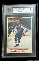 Front of encapsulated Phil Esposito O-Pee-Chee card showing grade label