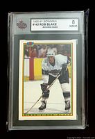 Front of graded Rob Blake rookie card showing Bowman design and KSA grade label 8 NMM