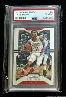Front of encapsulated Trae Young 2019 Panini Prizm #31 card showing PSA label with GEM MT 10 grade