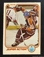 Front of Wayne Gretzky O-Pee-Chee #125 card showing action image, borders and logos