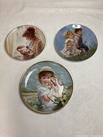 Front view of three Reco collector plates