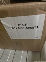 Box exterior showing label 4" x 2" 1000 laser sheets